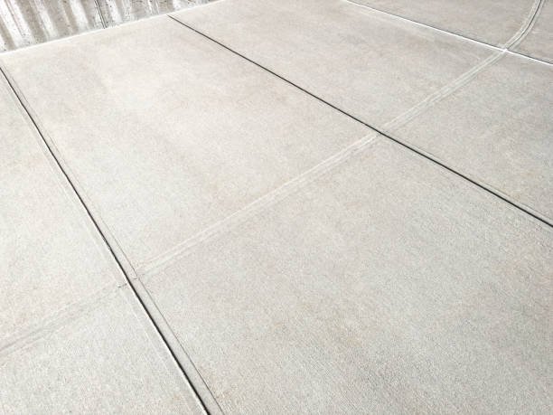 concrete sidewalk showing crack joints.